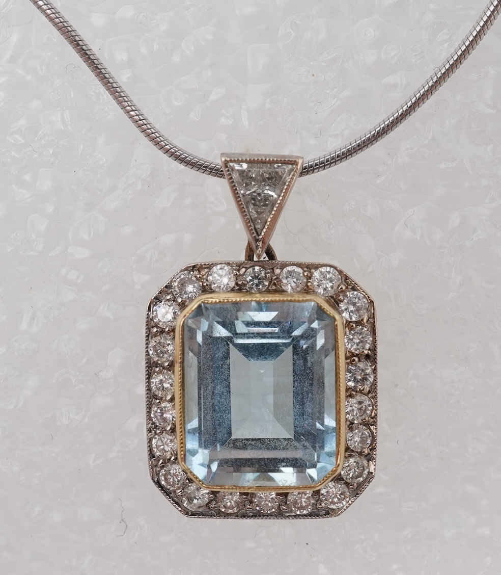 An aquamarine and diamond pendant